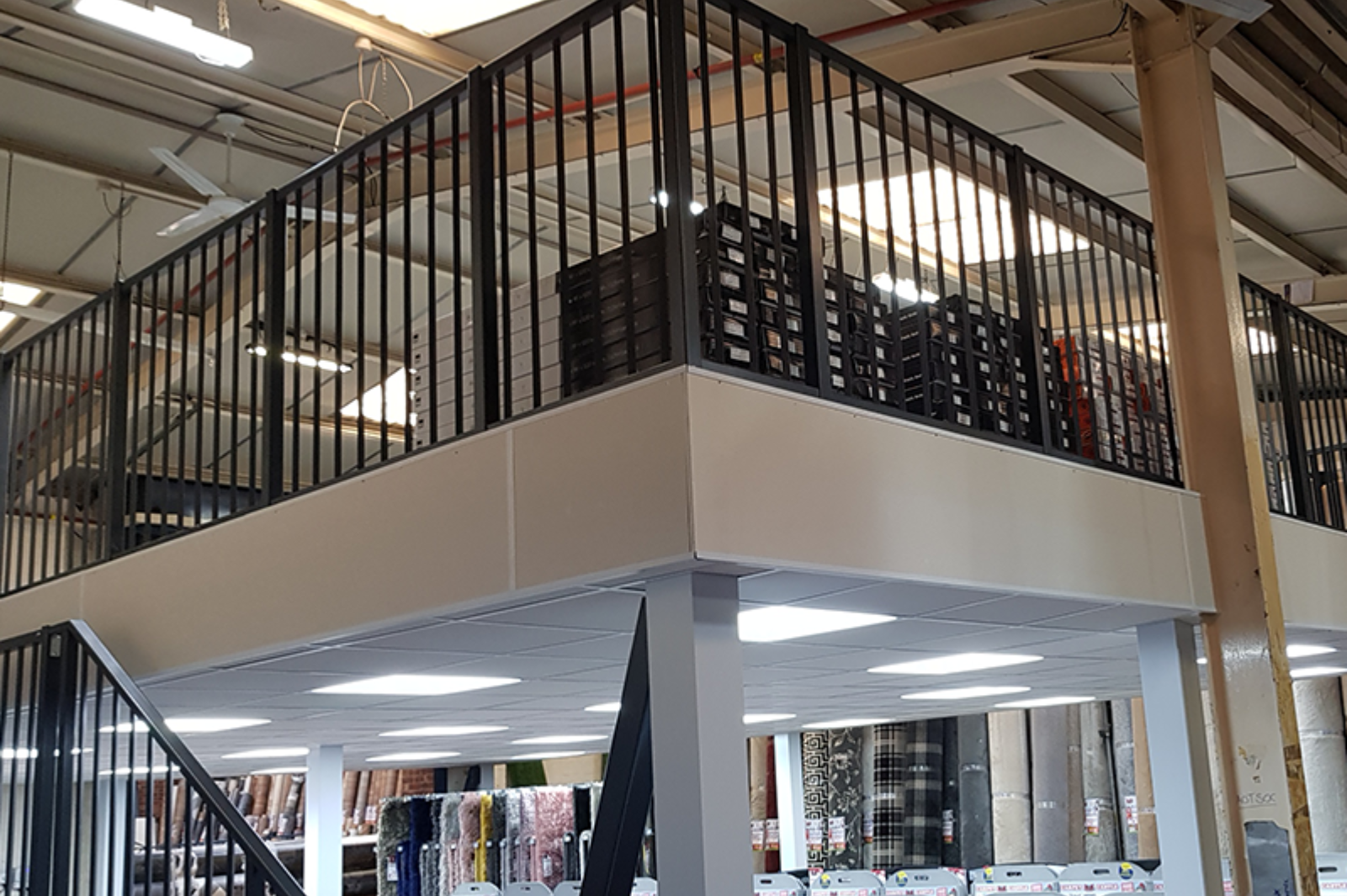 Retail mezzanine floor showcasing clothing displays